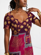"Vuli" Sweetheart Midi Dress — close-up of the sweetheart neckline and short sleeve