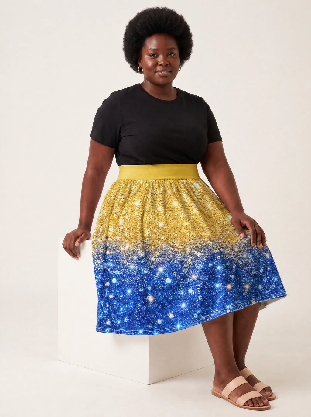 "Angaza" Twirl Skirt — seated on model