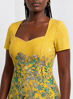 "Alfajiri" Sweetheart Midi Dress — close-up of the sweetheart neckline and short sleeve