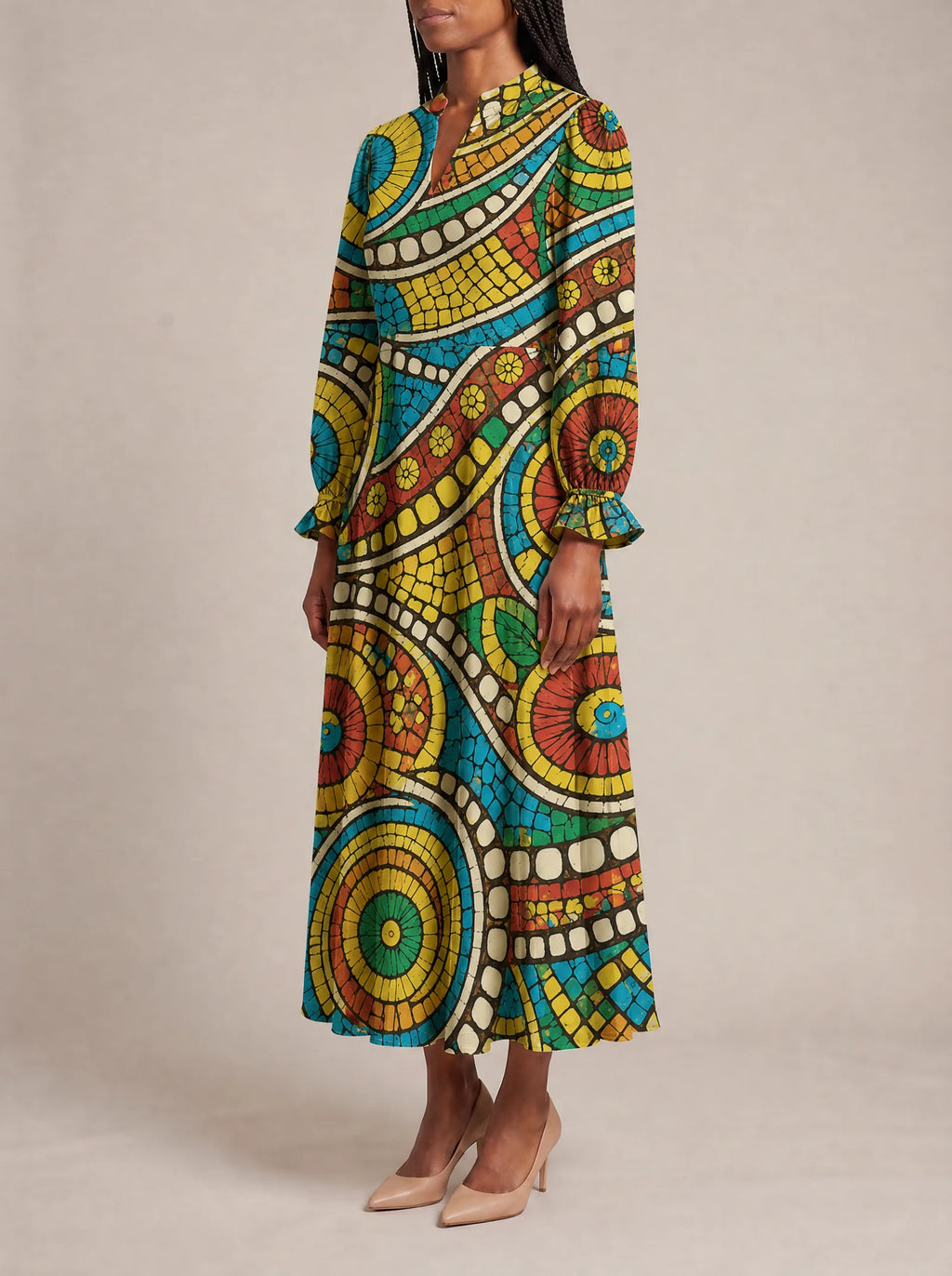 "Taji" Long Puff Sleeve Dress — three-quarter view on model