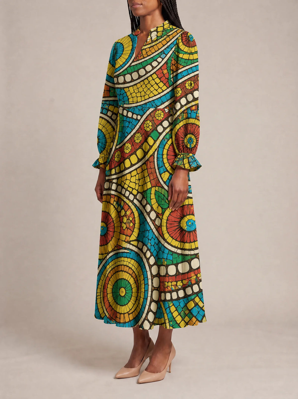 "Taji" Long Puff Sleeve Dress — three-quarter view on model