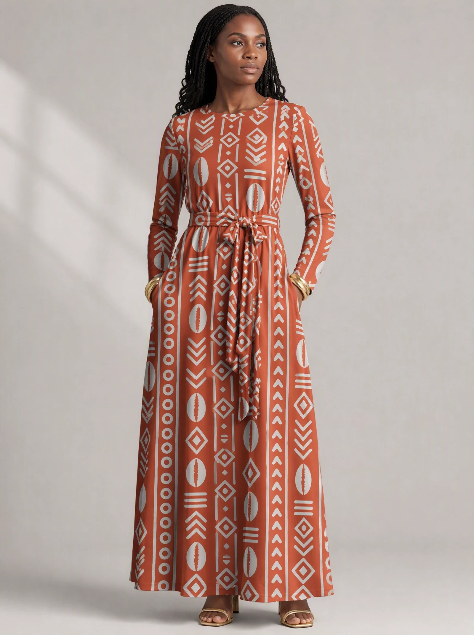 "Oshun Kijani" Viscose Midi Dress — close-up of the round neckline and long sleeve