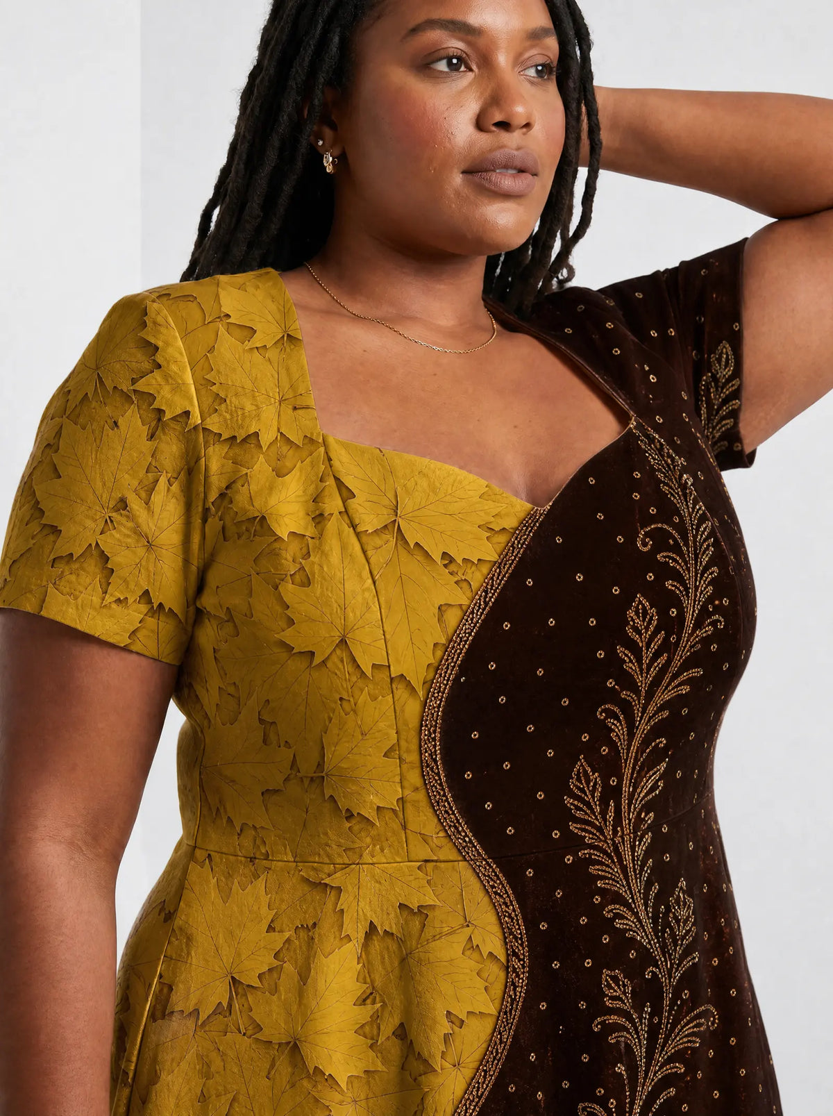 "Msimu" Sweetheart Midi Dress — close-up of the sweetheart neckline and short sleeve