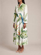 "Ndege" Long Puff Sleeve Dress — three-quarter view on model