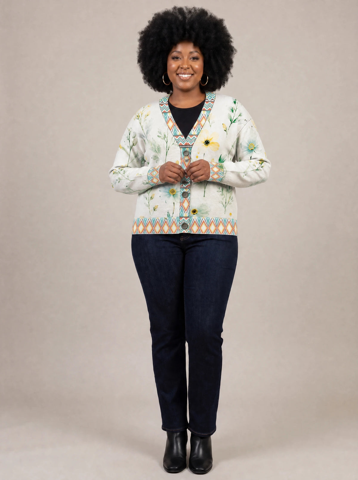 "Alizeti" Cardigan — on model fastening the buttons