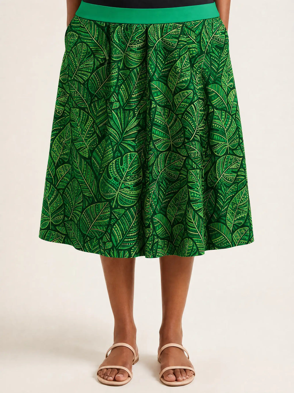 "Asili Emerald" Twirl Skirt — close-up of the hem at mid-calf