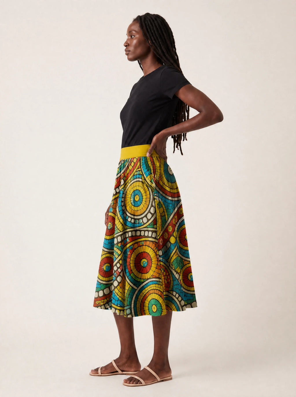 "Taji" Twirl Skirt — side profile on model
