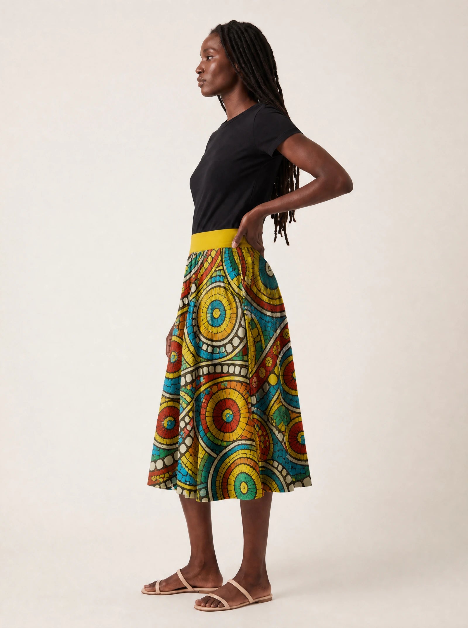 "Taji" Twirl Skirt — side profile on model
