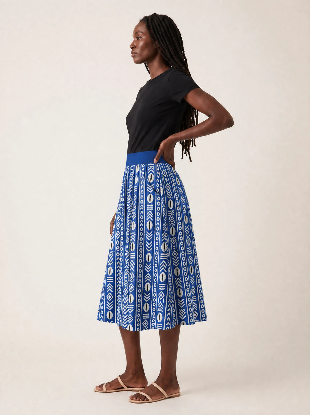 "Oshun Royal Blue" Twirl Skirt — side profile on model