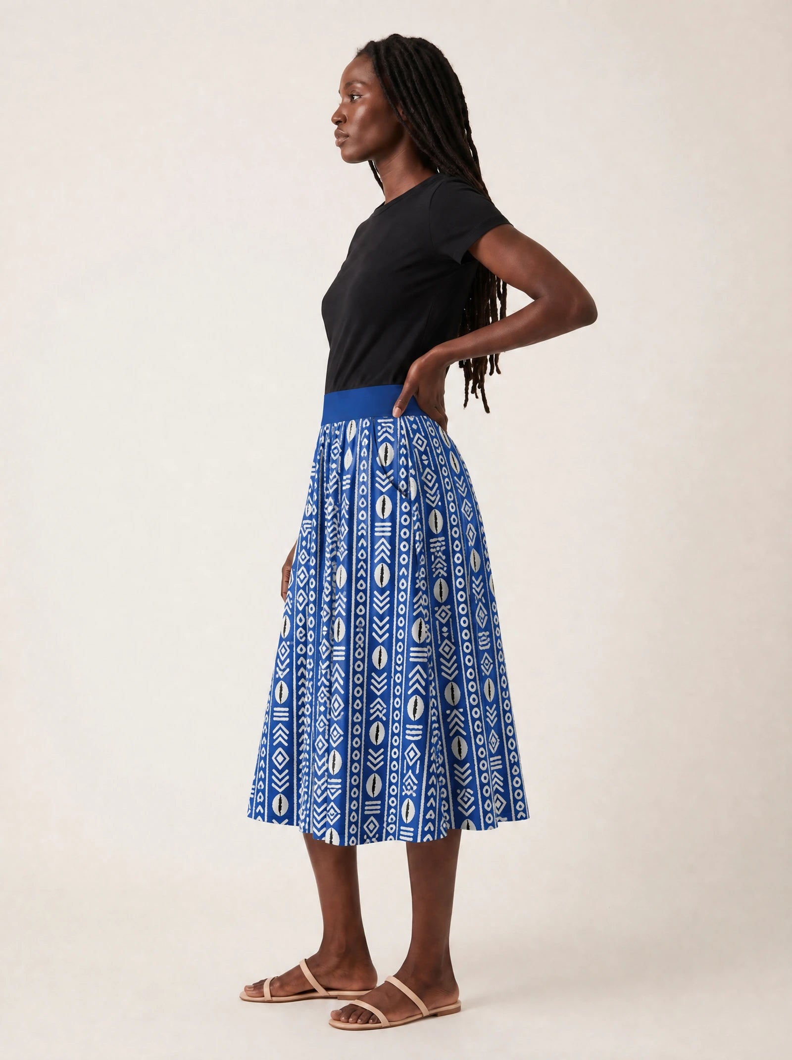 "Oshun Royal Blue" Twirl Skirt — side profile on model