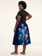 "Bahari" Twirl Skirt — back three-quarter view, looking over shoulder