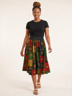 "Kumbuka" Twirl Skirt — walking, skirt in motion