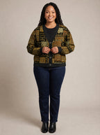 "Sankofa" Knitted Cardigan — on model fastening the buttons