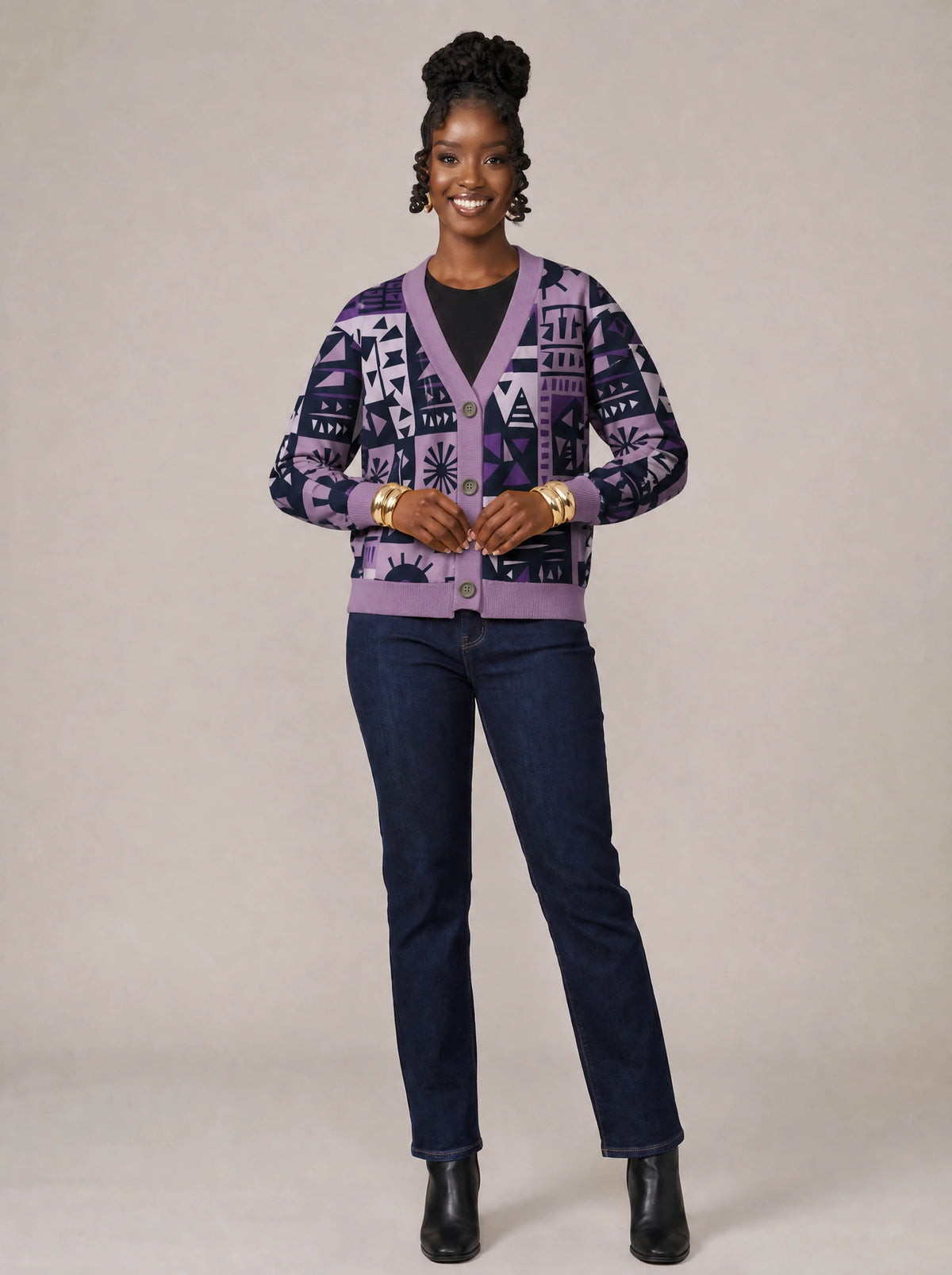 "Lavenda" Cardigan — on model fastening the buttons