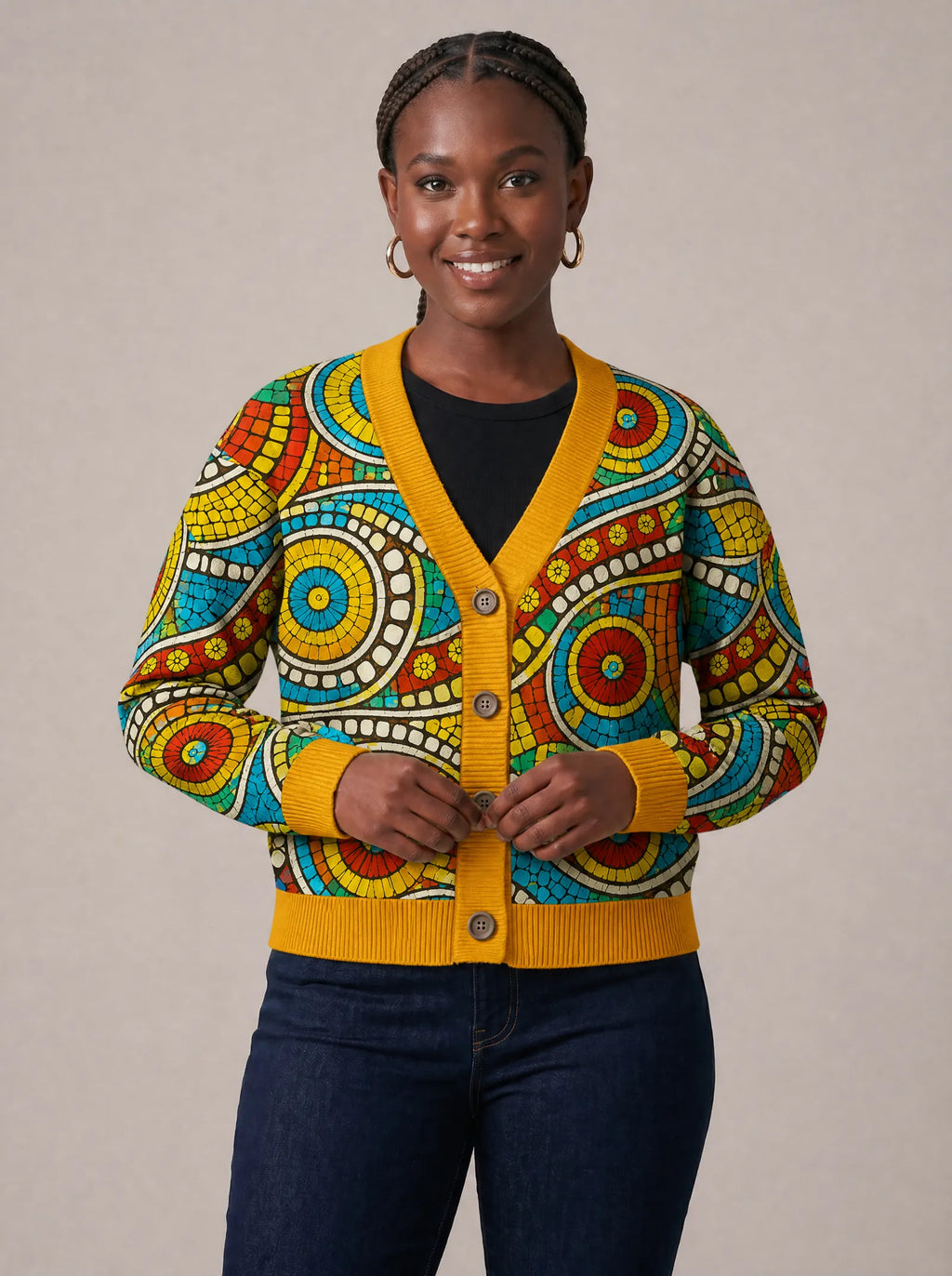 "Taji" Cardigan — on model fastening the buttons