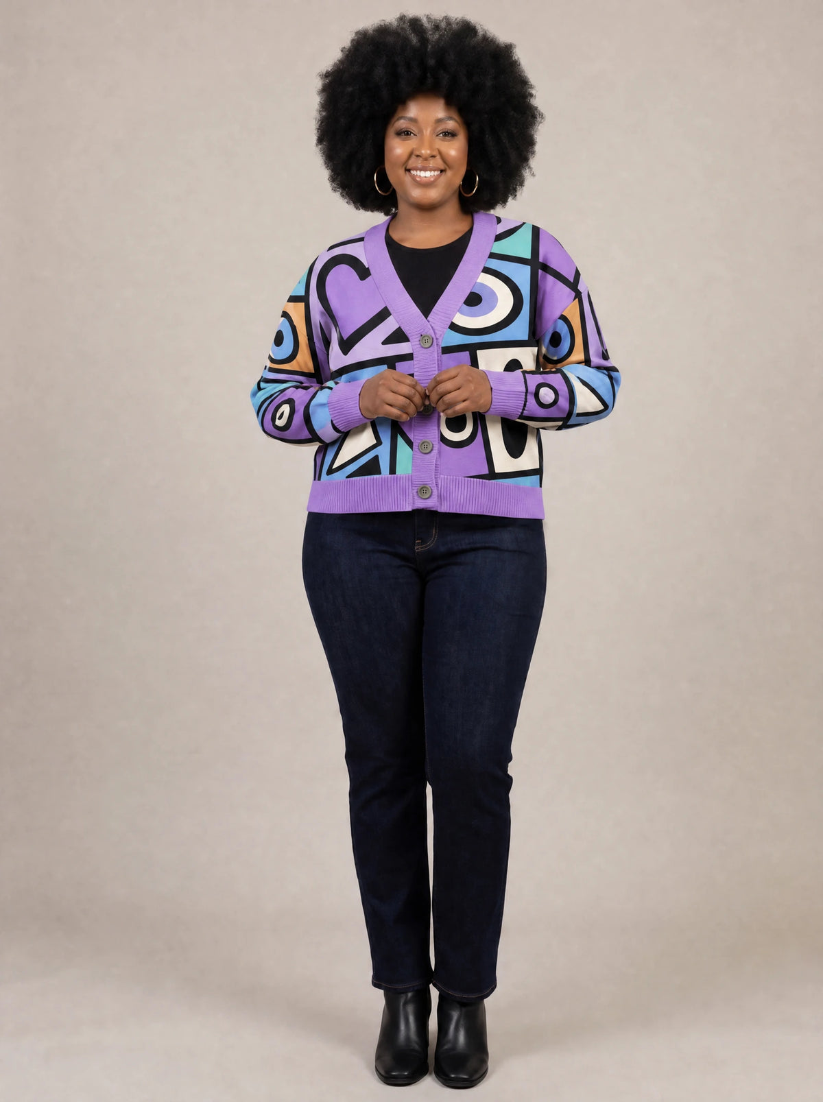 "Sanaa" Cardigan — on model fastening the buttons