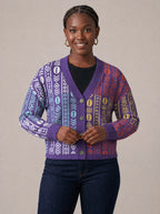 "Oshun Zamani" Cardigan — on model fastening the buttons
