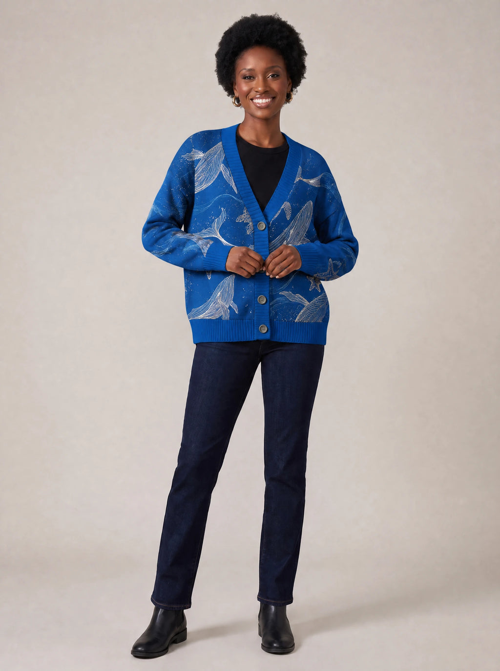 "Pwani" Cardigan — on model fastening the buttons