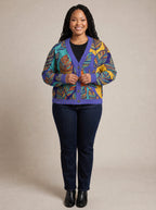 "Majani" Cardigan — on model fastening the buttons