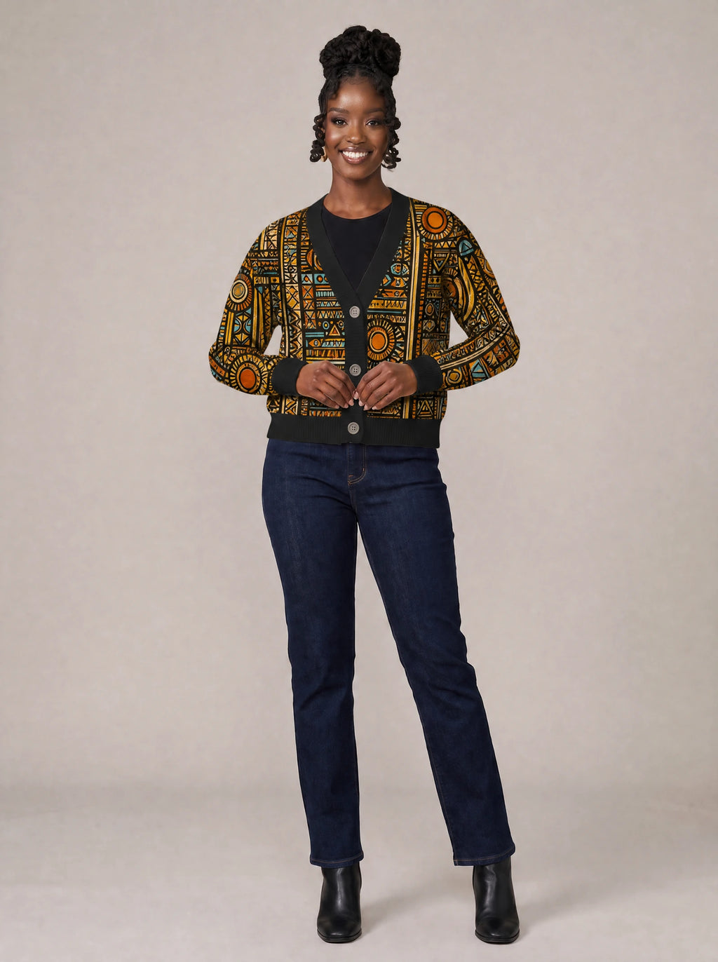 "Afrocentric Pattern" Cardigan — on model fastening the buttons