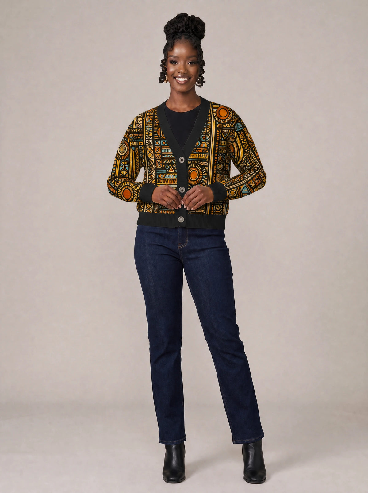 "Afrocentric Pattern" Cardigan — on model fastening the buttons