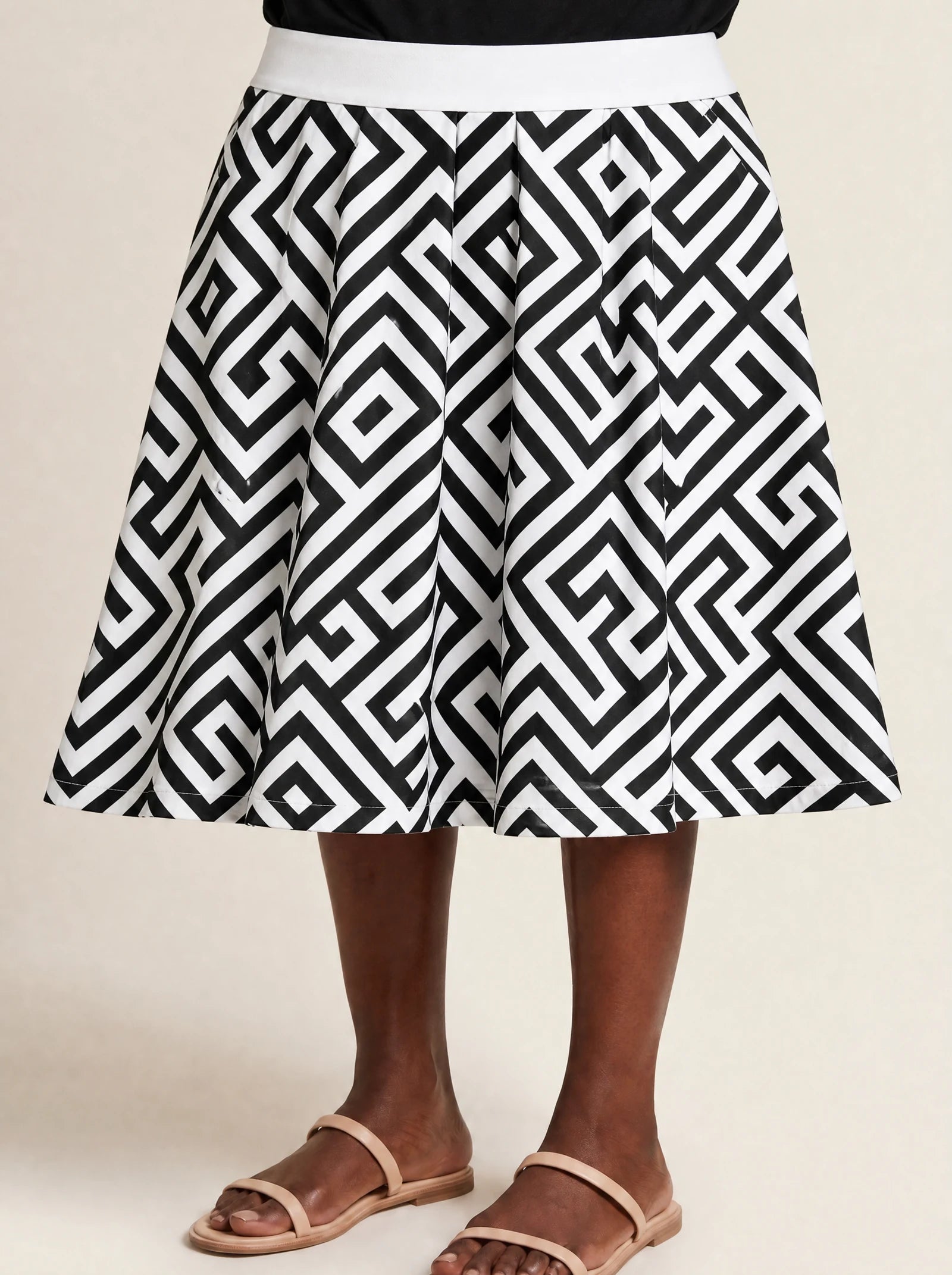 "Zamu" Twirl Skirt — close-up of the hem at mid-calf