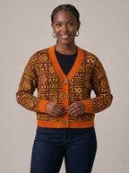 "Mudcloth" Cardigan — on model fastening the buttons