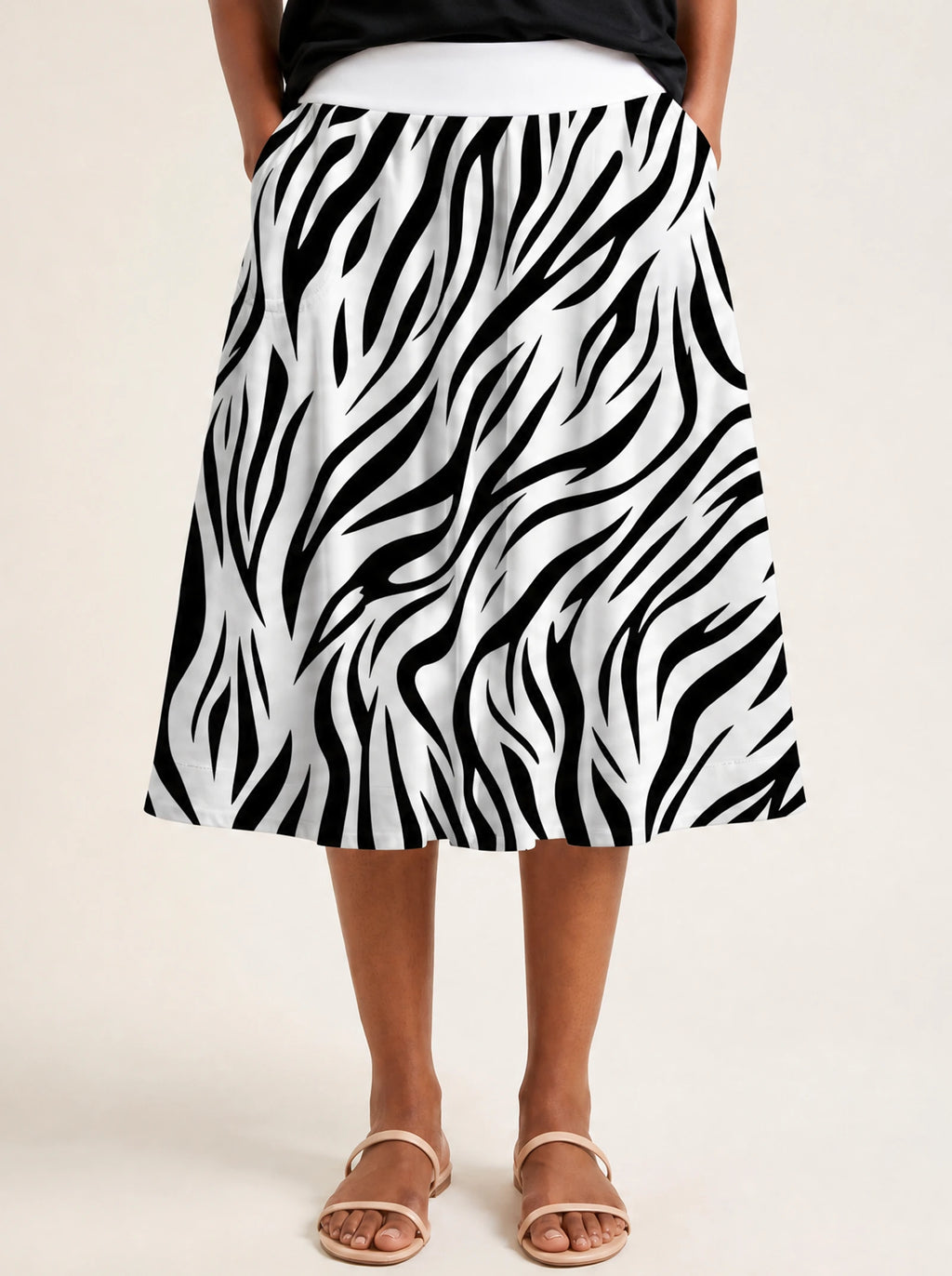 "Milia" Twirl Skirt — close-up of the hem at mid-calf