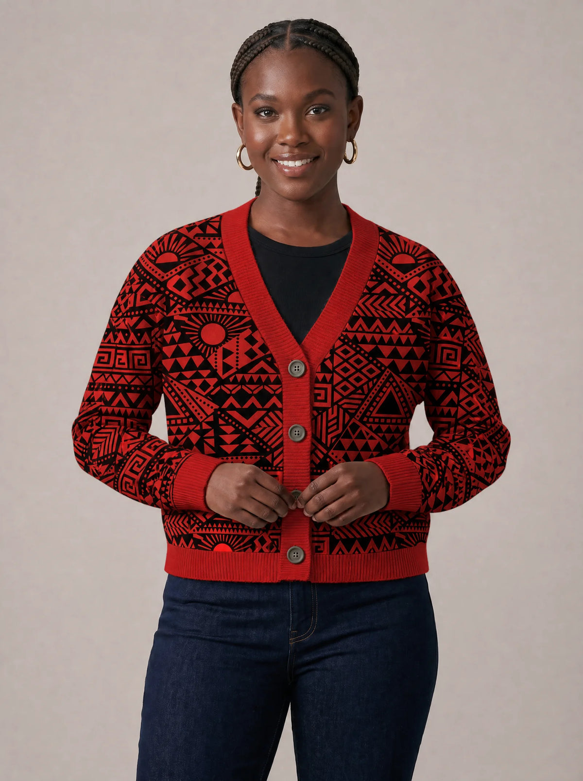 "Shaka" Burgundy Cardigan — on model fastening the buttons
