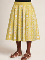 "Oshun Dhahabu" Twirl Skirt — close-up of the hem at mid-calf