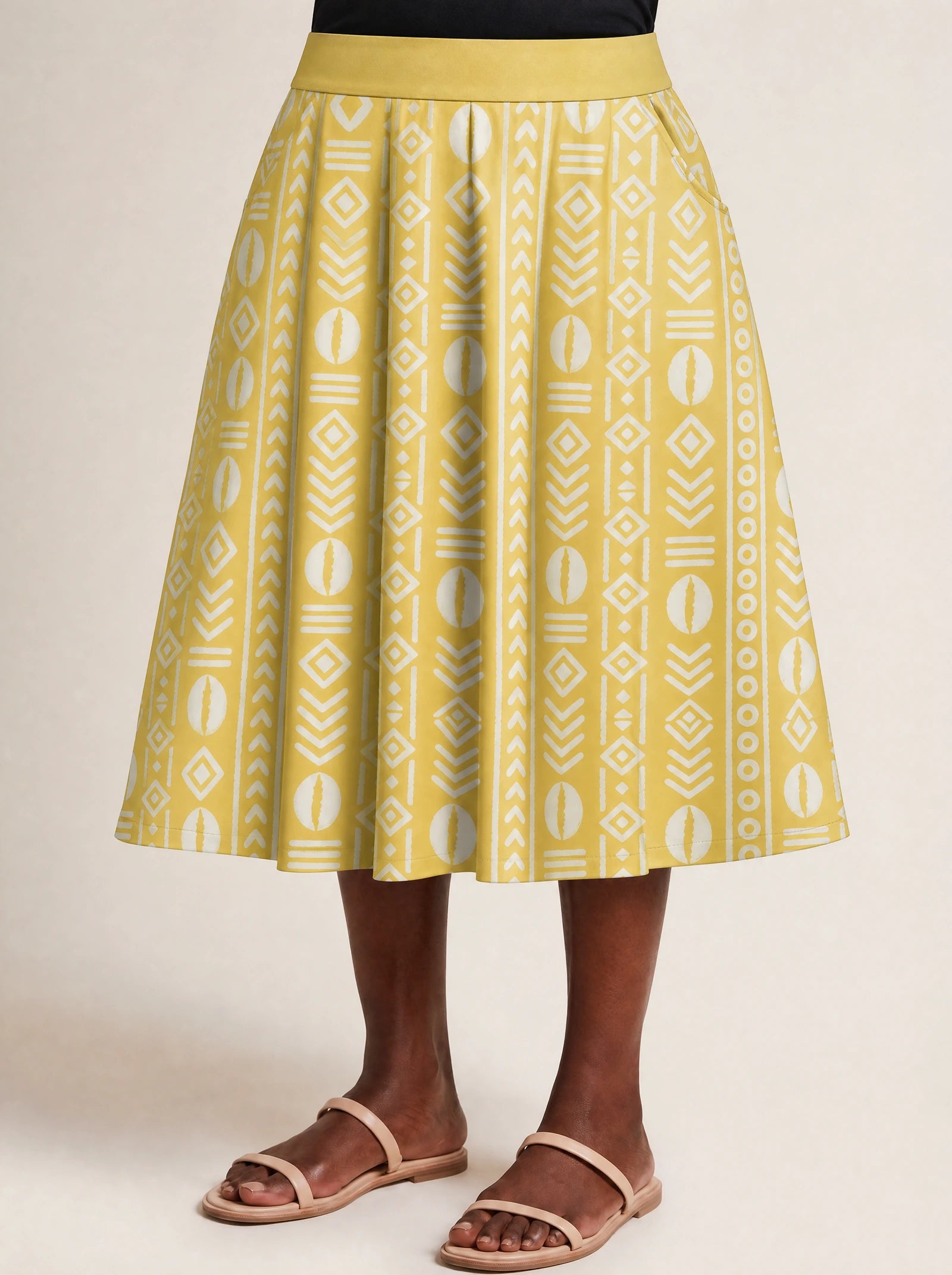 "Oshun Dhahabu" Twirl Skirt — close-up of the hem at mid-calf