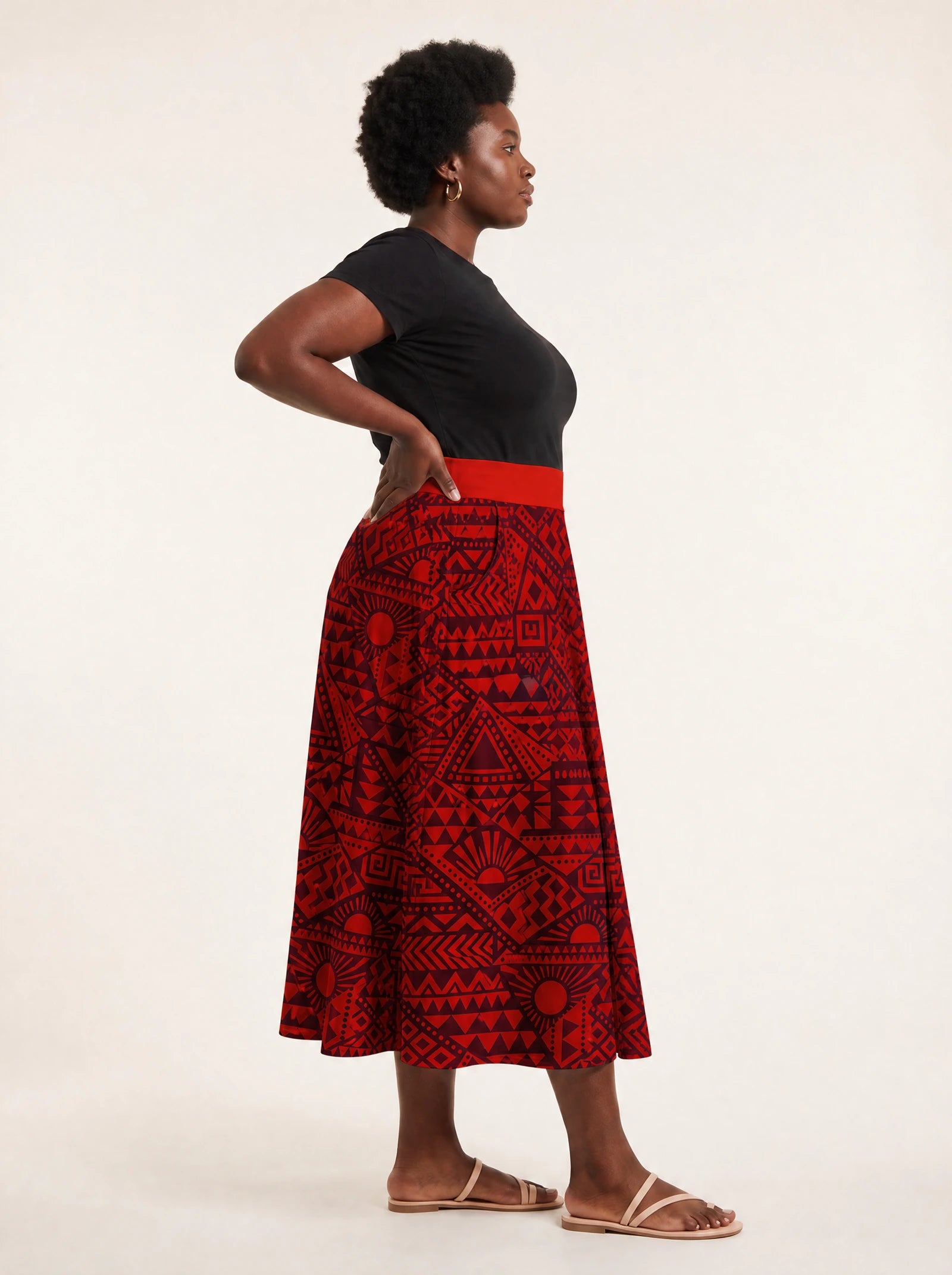 "Shaka Burgundy" Twirl Skirt — side profile on model