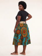 "Mto" Twirl Skirt — back three-quarter view, looking over shoulder