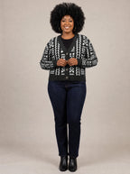 "Kuba" Cardigan — on model fastening the buttons