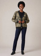 "Sahara" Cardigan — on model fastening the buttons