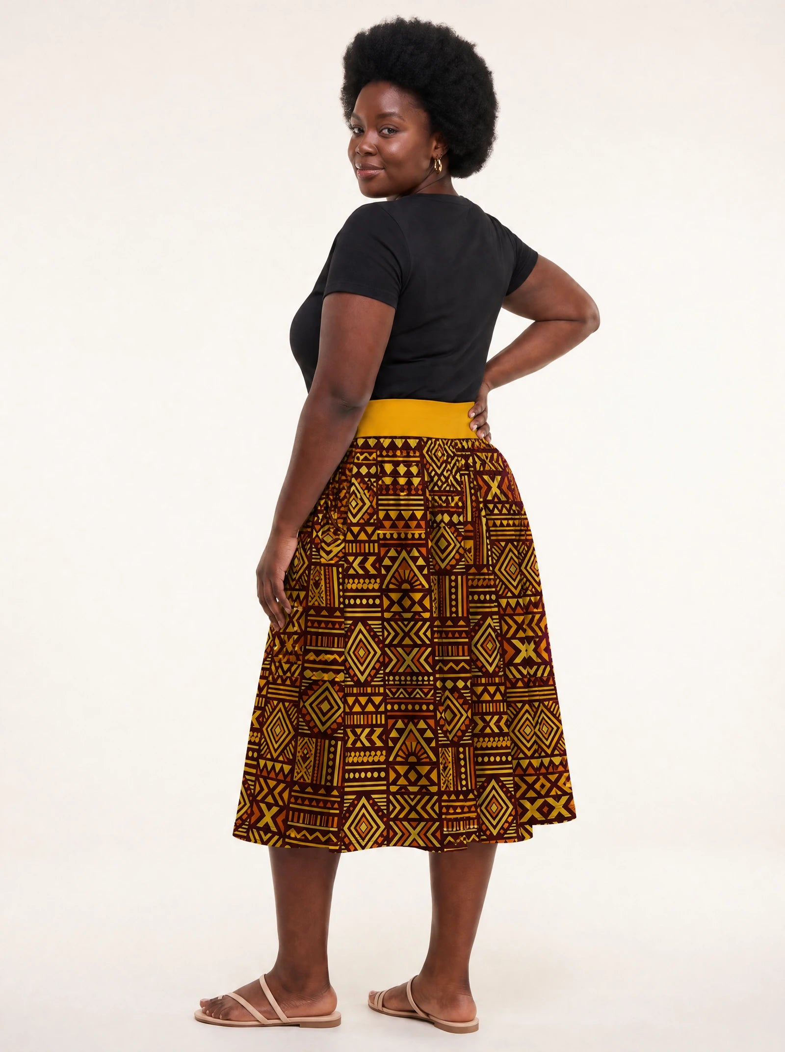 "Mudcloth" Twirl Skirt — back three-quarter view, looking over shoulder