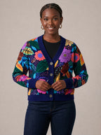 "Bustani" Cardigan — on model fastening the buttons