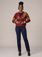 "Mavuno" Cardigan — on model fastening the buttons