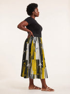 "Mvua" Twirl Skirt — side profile on model
