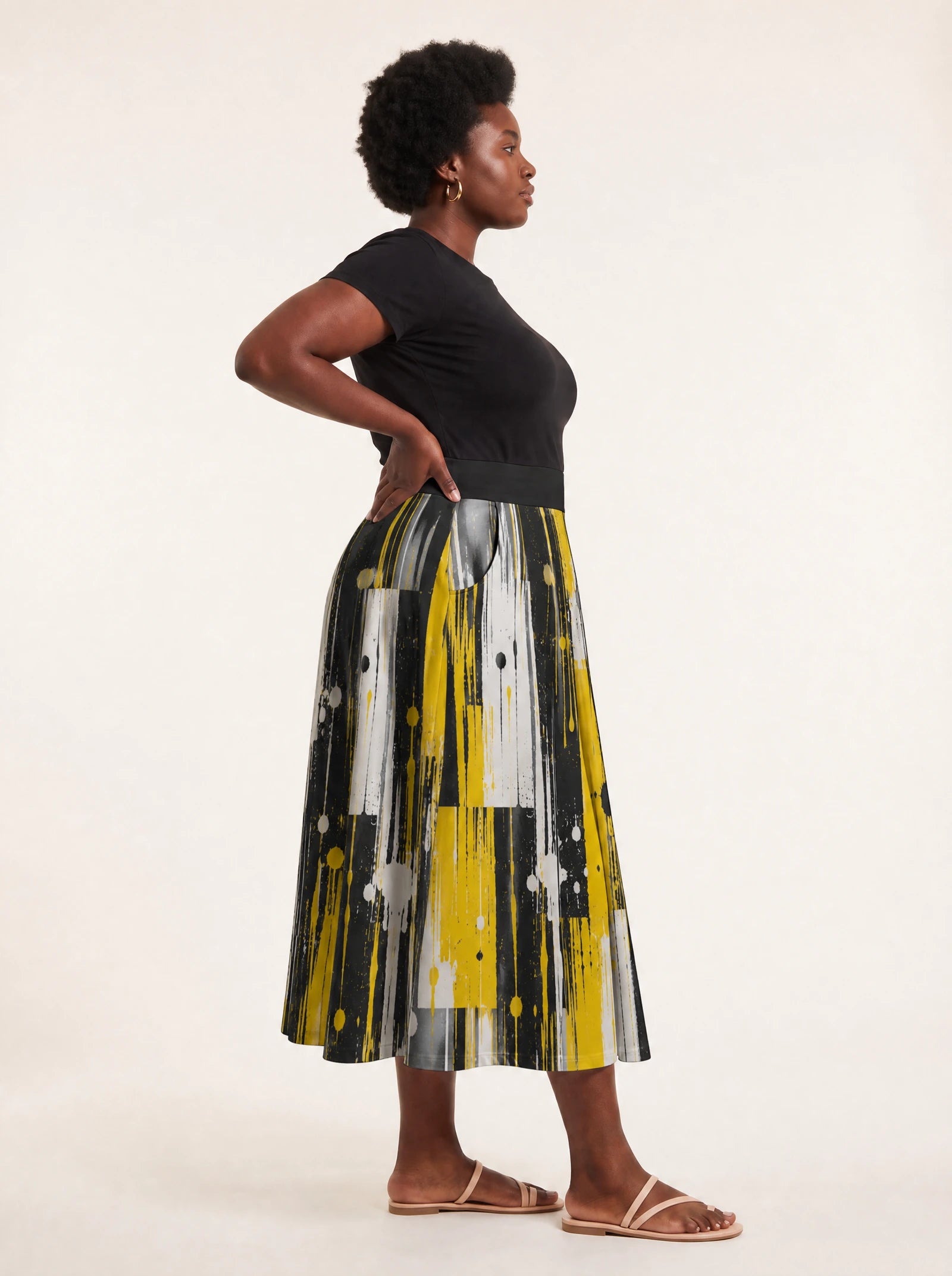 "Mvua" Twirl Skirt — side profile on model