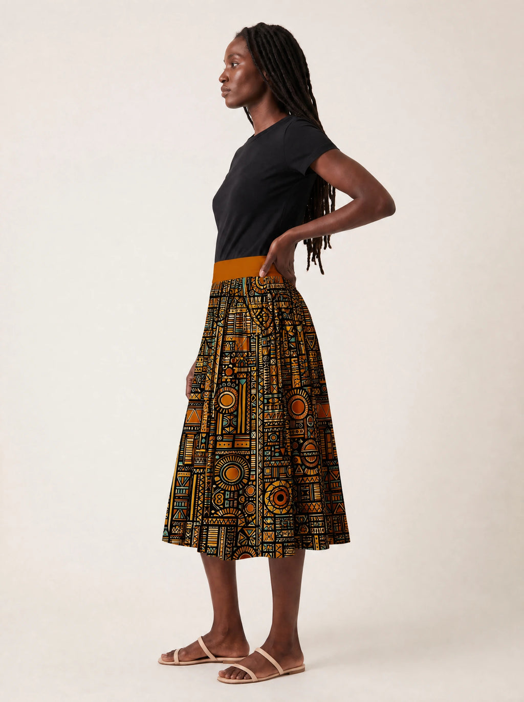 "Afrocentric Pattern" Twirl Skirt — side profile on model