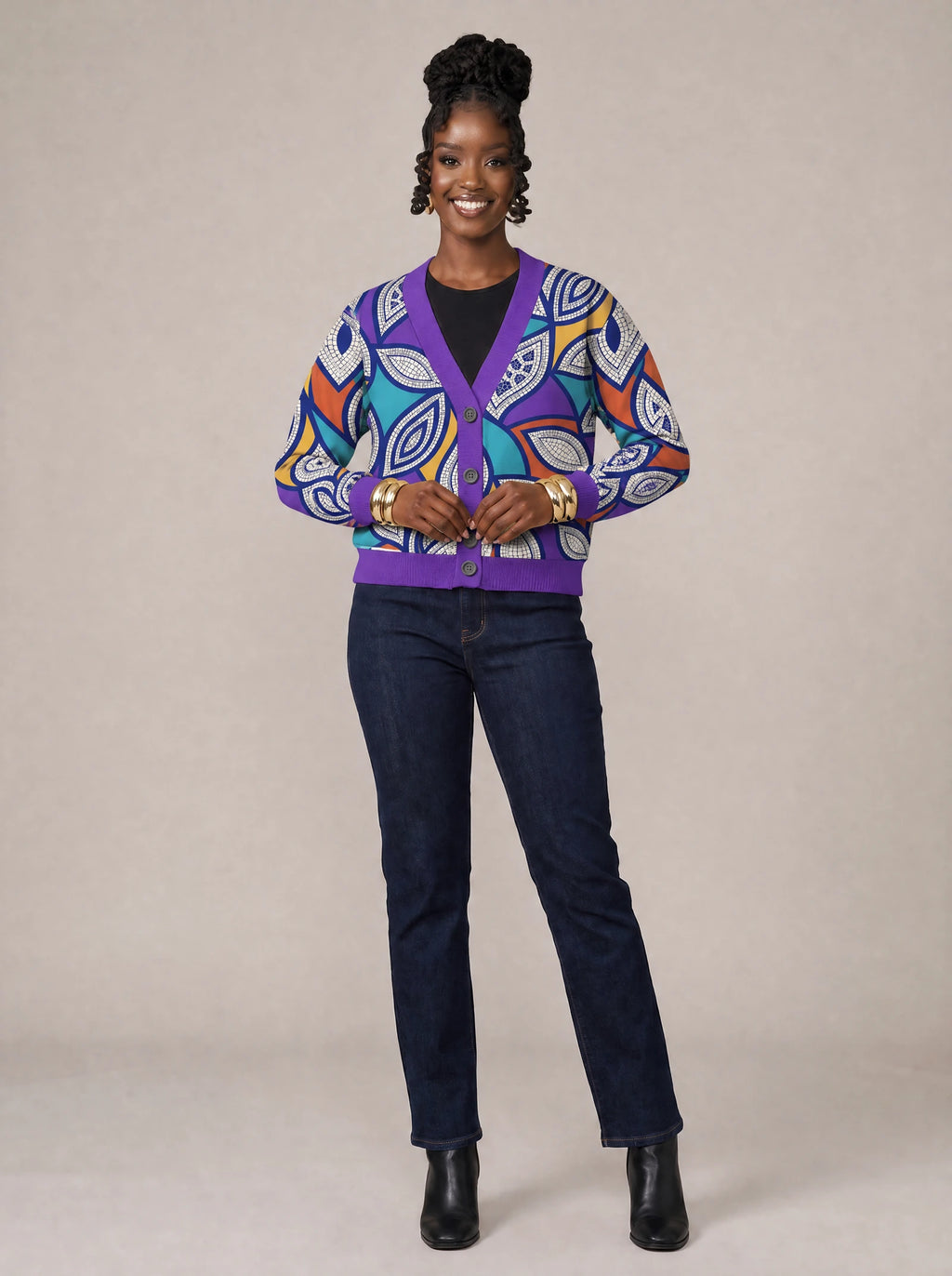 "Johari" Cardigan — on model fastening the buttons