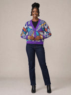 "Johari" Cardigan — on model fastening the buttons