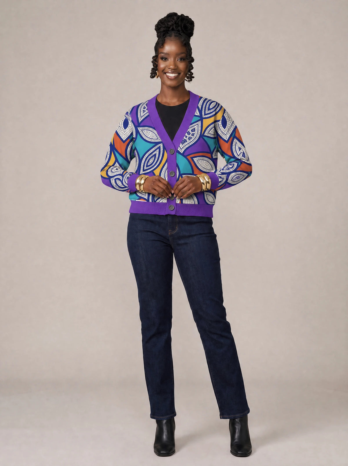 "Johari" Cardigan — on model fastening the buttons