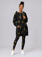 "Ishara" Hoodie Dress — front view on model, styled with the matching leggings