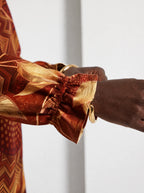 "Joto" Long Sleeve Maxi Dress — close-up of the gathered ruffle cuff at the wrist