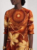 "Joto" Long Sleeve Maxi Dress — close-up of the high round neckline