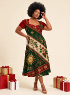 "Jua Kuu" Sweetheart Midi Dress — on model, Christmas backdrop