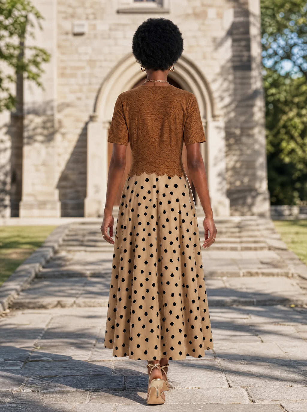 "Kahawa" Short Sleeve Maxi Dress — back view on model in the churchyard
