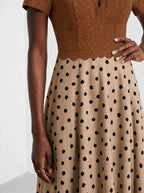 "Kahawa" Short Sleeve Maxi Dress — standing, angled view on model